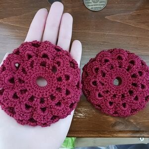 Handmade crochet mandala bun covers in red, set of 2